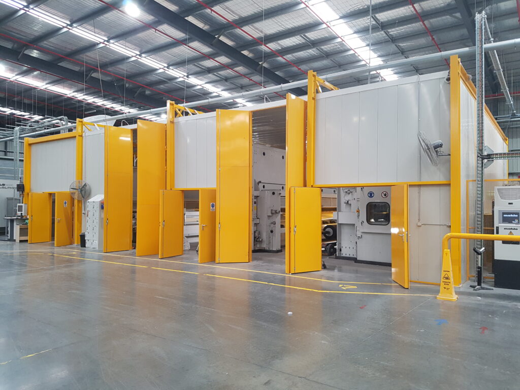Large yellow acoustic enclosure for a QLD manufacturer