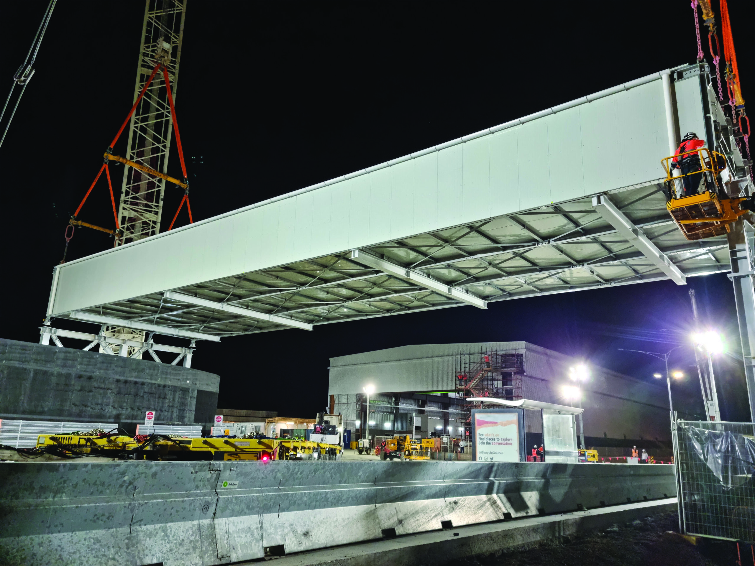 Large AcousTech enclosure being lifted into place