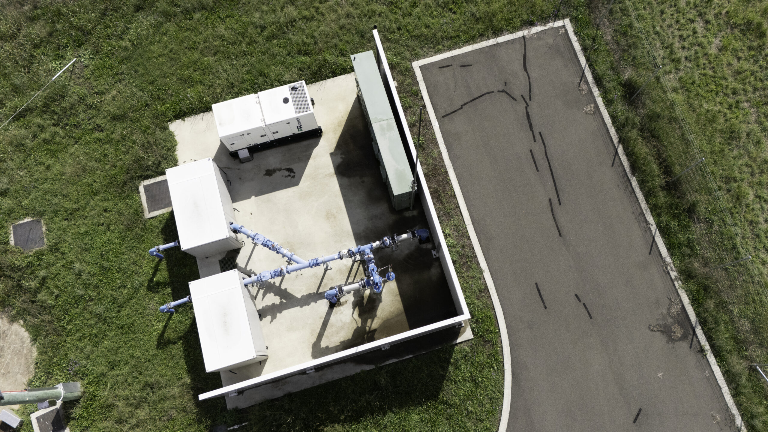 Ariel view of a Sonic acoustic wall keeing pump noise at bay