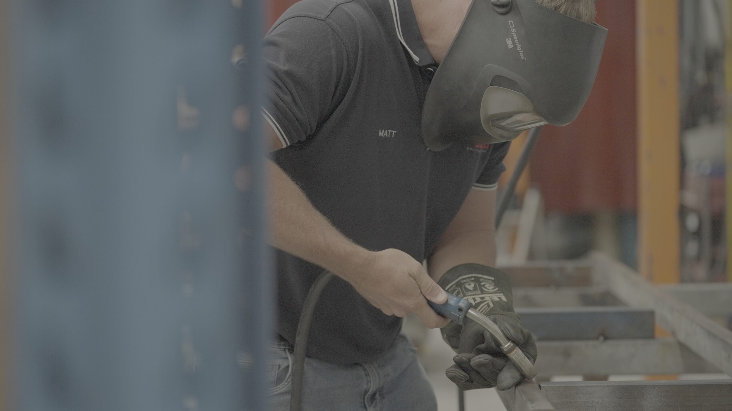 AcousTech team member hard at work in the factory