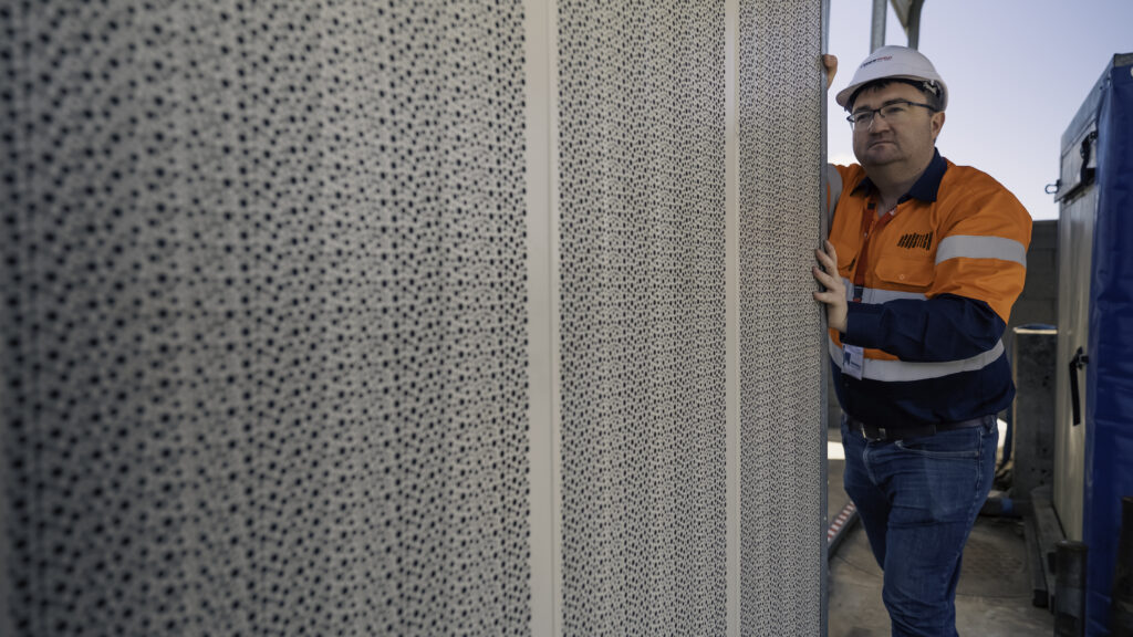 AcousTech GM on site inspecting product