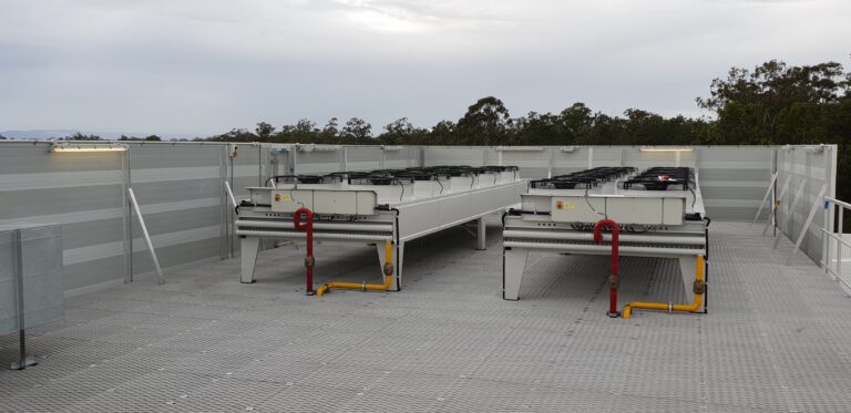 AcousTech noise wall surrounding HVAC equipment